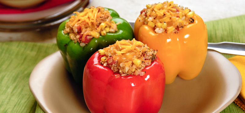 Rice, corn, and cheese make a yummy filling to complement the flavor of the pepper.