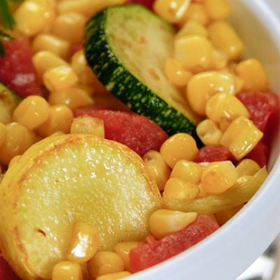 Summer squash pair with tomatoes and corn in this easy, flavorful side dish.